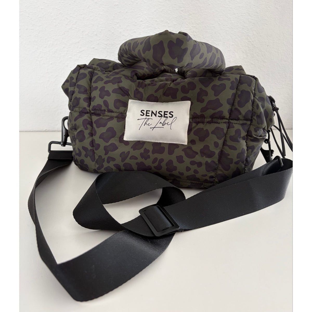 Senses. the label Crossbody Puffer Bag