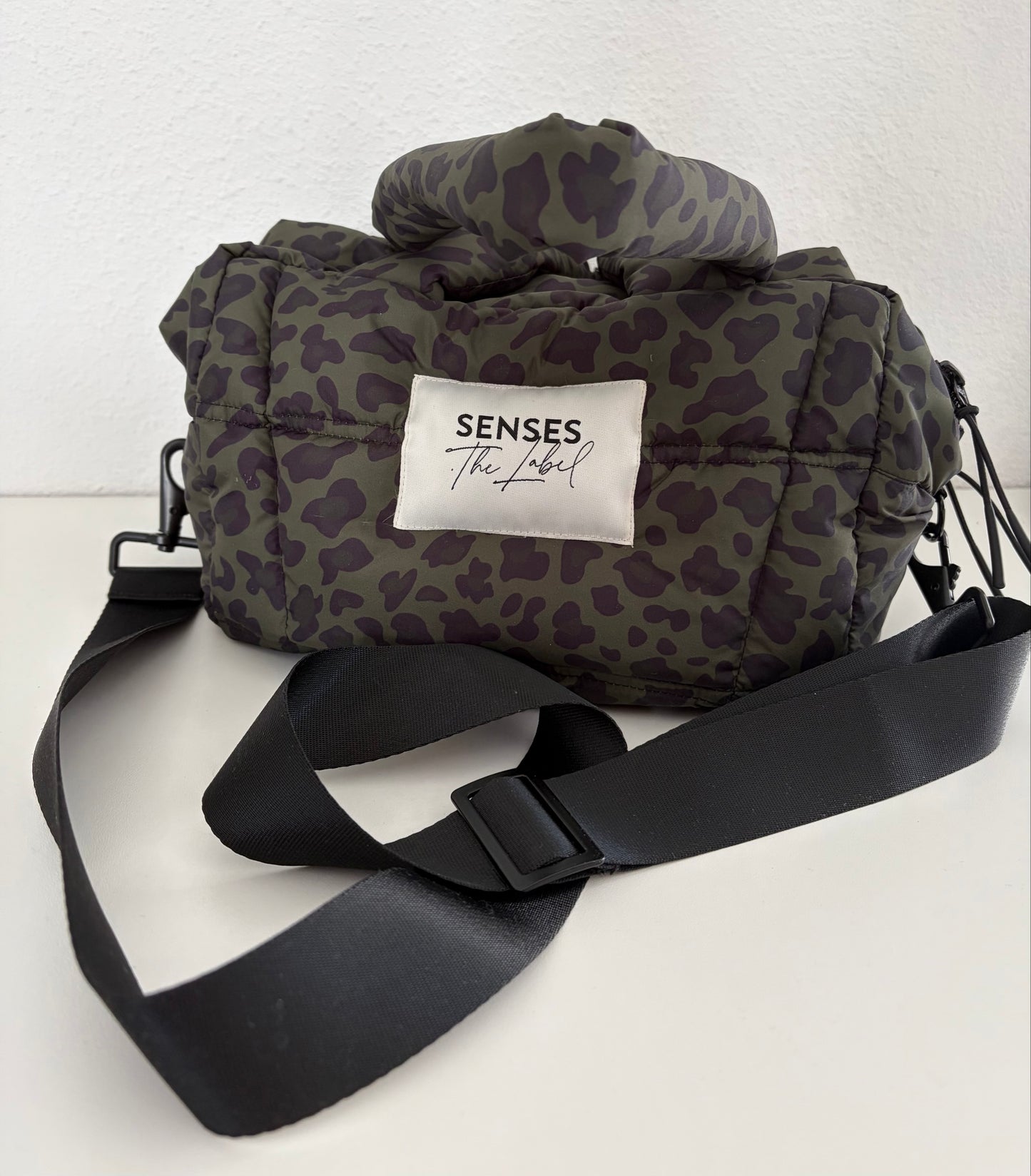 Senses. the label Crossbody Puffer Bag
