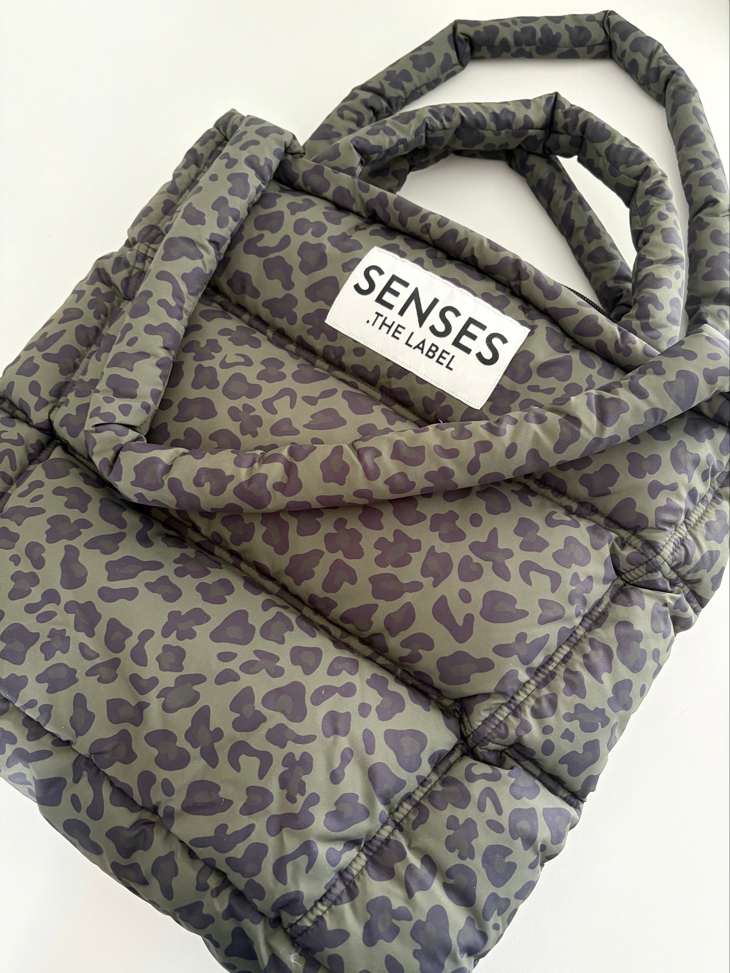 Senses. the label Puffer Bag