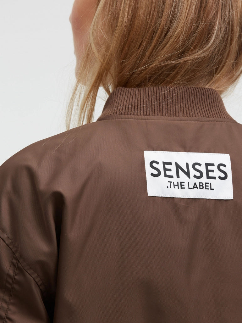Senses. the label Blouson